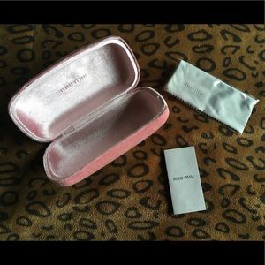 Miu miu sunglasses hard case.